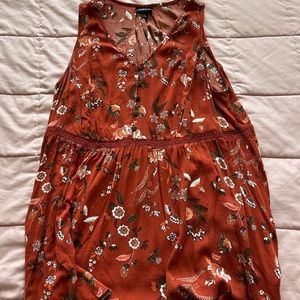 Cute burnt orange tank top. Only worn once or twice.